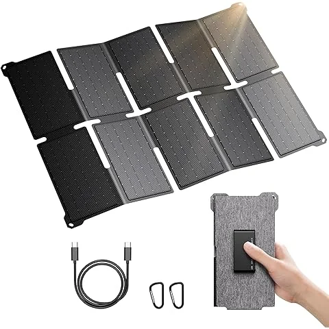 Foldable solar panel clipped to the back of a hiking pack on a trail in Georgia's national forest